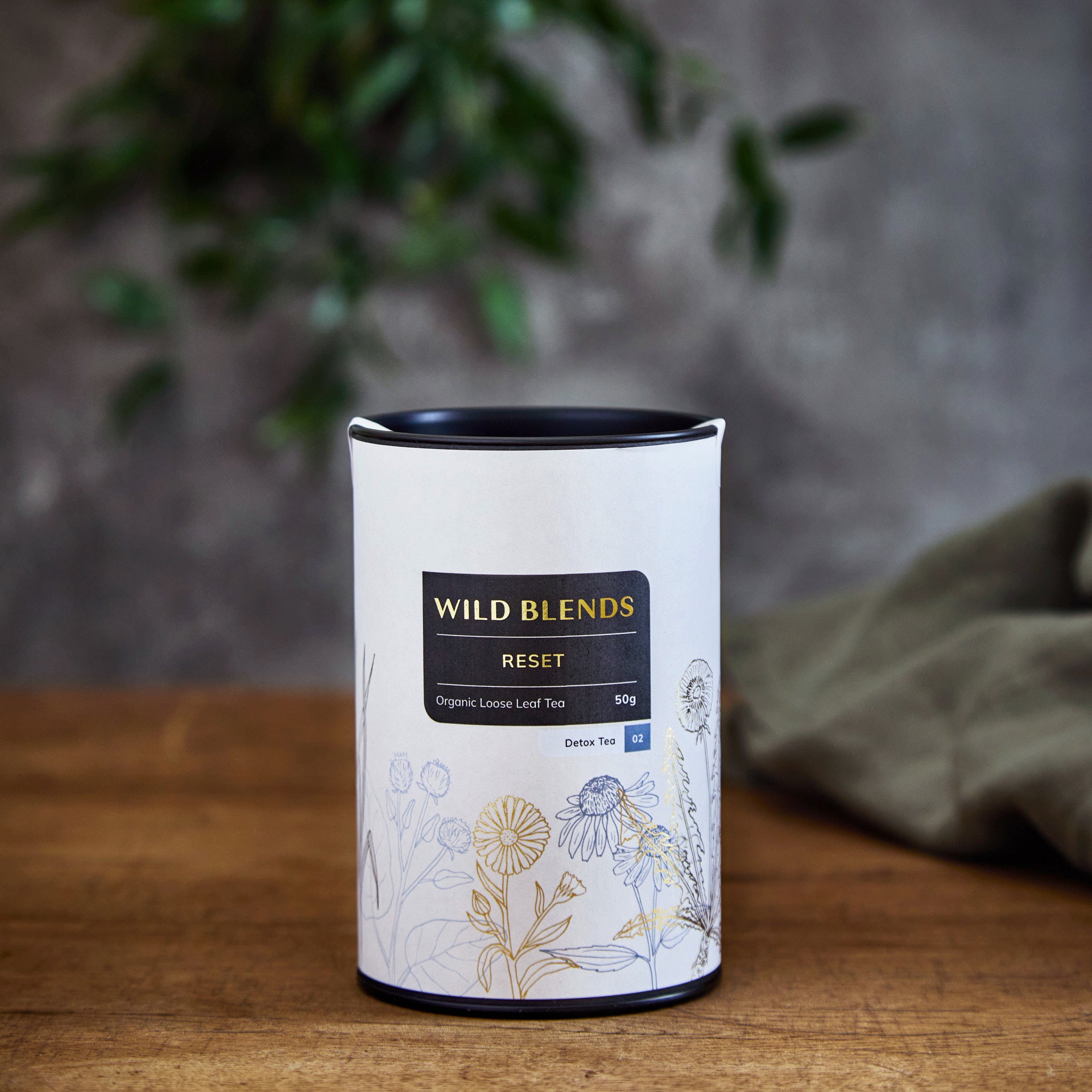 Wild Blends Reset Tea tin image